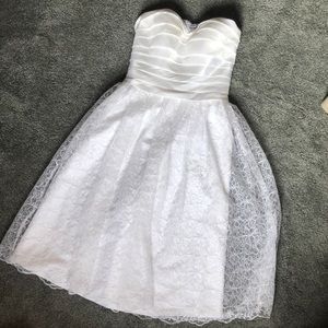 White eyelet tea length dress. Strapless